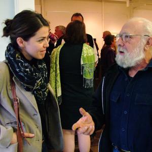 Generations of the creative economy: Artists Susan Dansereau and Joe Ascrizzi talk after a presentation by the Maine Arts Commission's new director Julie Richard at Waterfall Arts, Oct. 31. Dansereau moved to Belfast from Rhode Island in July. Ascrizzi, of Freedom, moved here from Connecticut in 1971. (Photo by Ethan Andrews)