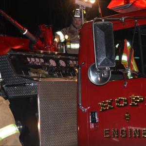 Hope firefighters turn out for a recent accident on Route 235, which set off a spate of calls that kept the town firefighters busy right through the night before Thanksgiving. (Photo by Lynda Clancy)