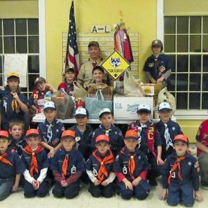 Front row from left - August Knause, Alex Todd, J.T. Johndro, Preston Henderson, Billy Kurzius, Cole Thompson; middle row - Matthew Clayton, Owen Weber, Brian Bland, Zackary Woehler, Joey Corey, Finn Mills, Alex Kurzius, Chris Cammelieri; back row - Greyson Orne, Jacob Pendleton, Wesley Henderson, Tanner Robinson, Zackery Wellman, Michael Brennan and Cub Master Brian Hebert.