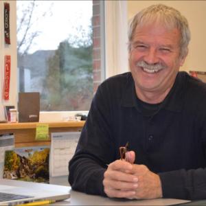 Tom Ford will be rising from his desk at Rockport Town Office May 31 and not returning, heading instead for his land in Hope to start a new chapter in life. (Photo by Lynda Clancy)