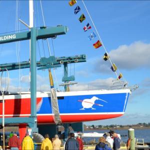Kiwi Spirit, the 63-foot cruising yacht built by Lyman Morse Boatbuilding Company, hovered just above high tide Nov. 1 before slipping into the St. George River and a life of competitive sailing. (Photos by Lynda Clancy)