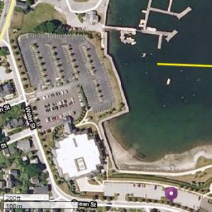 Ryan Counce, 30, of Rockland, was located at the end of the pier, indicated by the yellow arrow. (Satellite image courtesy MapQuest)