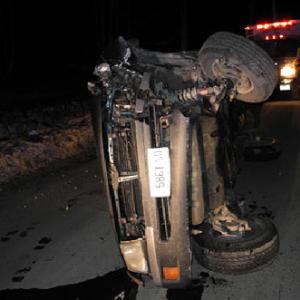 A truck being driven by Dennis Arey of Camden, who had crashed head-on into a tree, was found by police on its side in the middle of Bayview Street early Thursday morning. (Courtesy Camden Police Department)