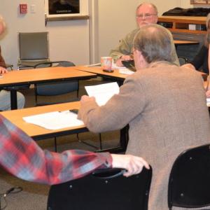 Rockport's Select Board held two executive sessions Tuesday night, Jan. 22. At the first one, Attorney Melissa Hewey, of the Portland firm Drummond Woodsum, talked with the board about its legal rights and duties concerning a personnel matter. At the second executive session, Town Attorney Robert Peabody joined the table. Board members at the meeting included Ken McKinley, Charlton Ames, Tracy Murphy and Chairman Bill Chapman. Board member Geoffrey Parker was in conversation with the group via telephone from New York City. (Photo by Lynda Clancy)