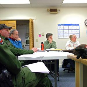 Representatives of the Maine Department of Inland Fisheries and Wildlife, from left, game wardens Michelle Merrifield and Mark Merrifield and IFW biologist Keel Kemper meet with members of the Islesboro Deer Reduction Committee, Jan. 3. (Photo by Ethan Andrews) Representatives of the Maine Department of Inland Fisheries and Wildlife meet with members of the Islesboro Deer Reduction Committee