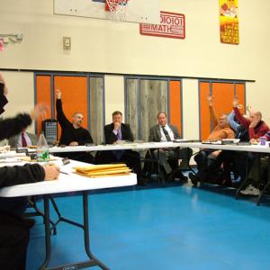 The RSU 20 board votes in the new teachers' contract on Tuesday night after four years of negotiation. The contract, which unifies the salaries of former SAD 34 and 56 teachers and staff is for the years 2012-2014. (Photo by Ethan Andrews)
