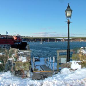 The Council held off on awarding a contract to build a new commercial fishing dock at the foot of Main Street — the ramp to the current dock is shown here — but made progress on parks and recreation and debated the idea of tax breaks for big businesses. (Photo by Ethan Andrews)