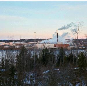 PROSPECT - The Verso Paper Co. mill in Bucksport, seen at dusk from the Propsect side of the Penobscot River. (Photo by Ethan Andrews)
