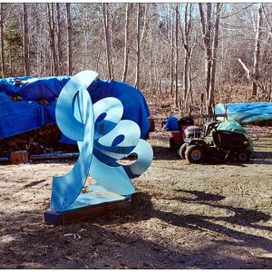 SEARSMONT - Tarp on the woodpile, check. Overturned boat, check. Modernist sculpture ... yep. (Photo by Ethan Andrews)