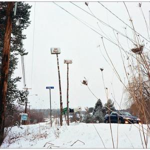 BELFAST - Mailboxes on tall poles labelled "Bills" and "Airmail" at the entrance to Airmail Lane, erected 30 years ago by Alden Horn. (Photo by Ethan Andrews)