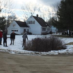 Engineer Andrew Hedrich led a tour along Acadia Drive with city officials in tow Wednesday afternoon, in the 1970s-era Pen Bay Acres development, uphill of busy Route 1. (Photo by John Maguire)