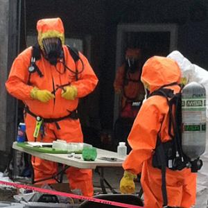 Maine Drug Enforcement agents and others at work Tuesday investigating a suspected methamphetamine laboratory on St. George Road (Route 131) in South Thomaston. A resident, Paul Mahonen, 36, has been arrested and charged with trafficking in drugs. (Courtesy Maine Drug Enforcement Agency)