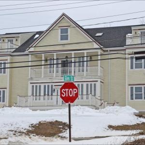 The 8,000-square-foot yellow house on the corner of Belyea Ave. and Camden Street (Route 1) in Rockland has been unoccupied since 2005, when it was constructed. A Union-based real estate holding company has hopes to convert it to five condominiums. (Photo by Lynda Clancy)