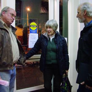 RSU 20 withdrawal organizer Steve Hutchings, left, talks with school board members Dorothy Odell, who also serves on the withdrawal committee, and Dean Anderson after a Tuesday night meeting of the Belfast City Council. (Photo by Ethan Andrews)