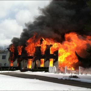 The house owned by David Vangel at 25 Lily Pond Drive in Camden is on fire. (Photo by Holly Edwards)