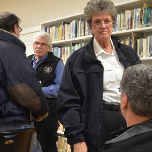 Camden First Aid EMS Chief Julia Libby chats with another ambulance service provider at a meeting of Hope selectmen. (Photo by Lynda Clancy)
