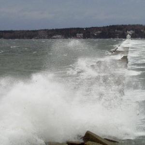 A large ocean storm blew a gale through the coastline on Friday, March 8, sending water over the Rockland Breakwater. (Photo by Bob Trapani)