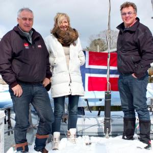 Norwegians Trond Aasvoll, Linda Lindeberg and Lars Ingeberg after sailing into Camden Harbor during Tuesday's snowstorm. (Photo by Chris Wolf)