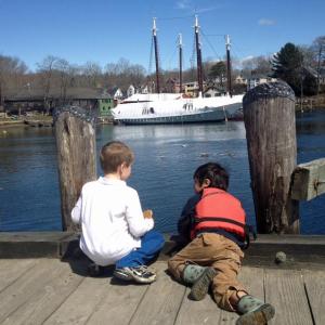 Henry Pixley, son of Camden Harbormaster Steve Pixley, and a friend, James, inspect the seagulls along the harbor's edge. (Courtesy Steve Pixley)