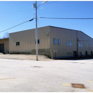 Belfast-based window manufacturer Mathews Bros. opted not to pursue a Community Development Block Grant through the city to expand its Perkins Road facility, but plans to reoccupy its long vacant downtown building, pictured. Maine Maritime Products also withdrew its bid for state grant funding. (Photo by Ethan Andrews)