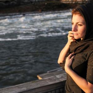 Daria Norvlaan modeing her own off black fine gauze tencel scarf. Courtesy Erin Little