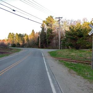 The railroad crossing at Oak Hill Road was the crux of a discussion May 7 regarding new parking and restrooms that could serve the end of the proposed city rail trail and also Brooks Preservation Society's excursion trains that will be running out of the adjacent City Point Station this year. (Photo by Ethan Andrews)