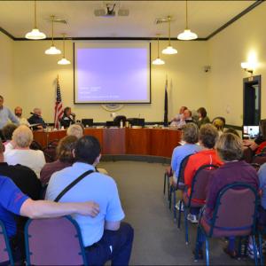 Camden citizens gather in the Washington Street meeting room June 5 to hear why a four-town review team is recommending the towns contract with North East Mobile Health Services for emergency medical services. (Photo by Lynda Clancy)