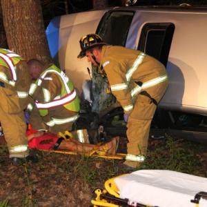 Rescue crews from Owls Head Fire Department and Rockland EMS tend to an injured driver at an early morning crash in Owls Head. (Photo courtesy Alan Athearn, Rockland Fire and EMS)