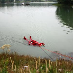 Tethered together at the end of nearly 600 feet of rope, South Thomaston Fire Chief Bryan Calderwood and firefighter Colby Miles float along the surface of the Weskeag River as firefighters on shore pull them in during water rescue training July 29. (Photo by Holly S. Edwards)