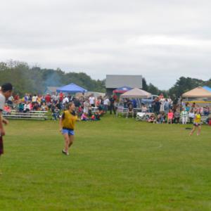 Hundredd and hundreds of members of the Midcoast community flocked to the Warren Athletic Fields Thursday to celebrate the life of Laken Kyle Harrington, and give tremendous support and love to the Harrington family. (Photo by Ron Hawkes)