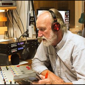 Ronald Van Heeswijk at the microphone during his Jazz program on WRFR. (Photo by Chris Wolf)