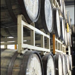 Barrels used for aging certain beers wait out their time at Shipyard Brewing. (Photo by Chris Wolf)