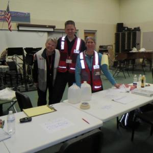 Red cross staff and volunteers greet people in search of warmth and power in the band room at Troy Howard Middle School. Staff said they had 11 people Monday night and as of 6pm Tuesday had over 20. 