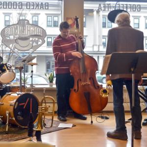 The Mike Whitehead Group, with Whitehead (back to), Jason Dean on drums, Spike Hyssong on bass and Steve Lindsay on keyboard, gets the show rolling a little before 1 p.m. (Photo by Ron Hawkes)