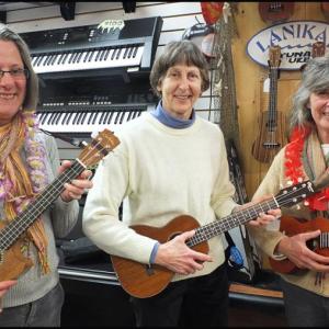 Left to right: Pam Farrar, of Ellsworth, Gloria Howard, of Bangor, and Linda Bohm, of Ellsworth, enjoy the fun at K2 Music.