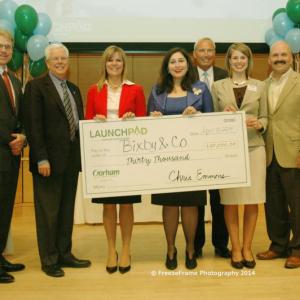 Kate McAleer holds the winning check after last night’s awards in Gorham Savings Bank’s LaunchPad business competition. (Courtesy Gorham Savings Bank)