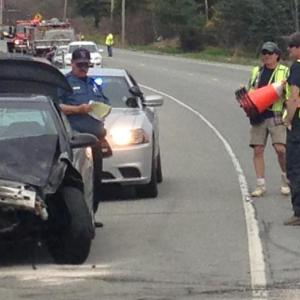Rockport Police Officer Craig Cooley and the Rockport Fire Department respond to two crashes on Route 17 in Rockport May 9. (Photo by Lynda Clancy)