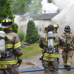 Camden, Lincolnville and Rockport fire departments converged at a house fire this morning, June 14, on Shermans Point Road while Hope and Union firefighters covered the Camden station in the event another incident occurred. (Photo by Lynda Clancy)