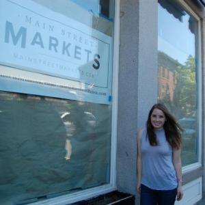 Jennifer Rockwell in front of Main Street Markets