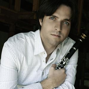 José Franch Ballester holding a clarinet.