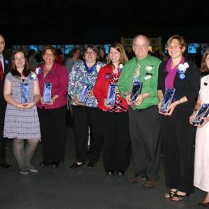 Greg Dufour, president and chief executive officer of Camden National Bank, congratulates award winners at this year’s Stakeholder Appreciation Event held on June 18 at the Augusta Civic Center. Pictured left to right: Dufour, Penny Johnson, Tena Wallace, Cindy Dines, Angie Snow, Danny Jackson, Betsy Maguire and Susan Van Allen.