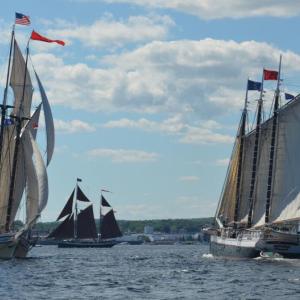 Local schooners Heritage, Angelique and Victory Chimes parade through Rockland Harbor on a perfect day for sailing, July 11. (Photo by Lynda Clancy)