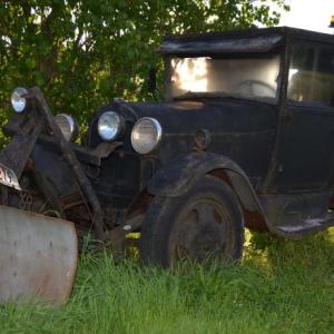 The plows get hooked to trucks in the fall, and the logs hauled in from the woods. This old truck lives in Warren. (Photo by Lynda Clancy)