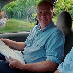 State Senate candidate Jonathan Fulford (D-Monroe) with a volunteer driver during a day of “doing doors” in Belfast. (Photo by Ethan Andrews)