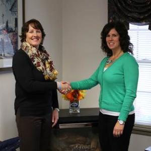 Left to Right: Susan Ware Page, Maritime Energy vice president and Leslie Eaton, Penobscot Bay YMCA board president.
