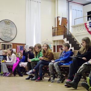 Fifth-graders from Searsport Elementary School got a first-hand look at the regular work of local government when they attended a meeting of the Searsport Select Board, Dec. 2. (Photo by Ethan Andrews)