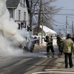 A close call in Rockland today on Route 1 as a Ford Explorer is fully engulfed by fire. (Photo courtesy Alan Athearn/Rockland Fire and EMS)