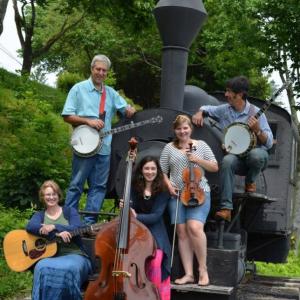 Miners Creek, with mother-daughter duo Resa and Emily Randolph and husband/dad/banjo player Whitney Randolph. Jesse McWilliams joins in on mandolin; Peter Proeller on claw hammer banjo; and Jenny Karod on viola/violin.
