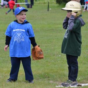 A pair of tee ball players in a June 5 contest in Rockland. (Photo by George Harvey)