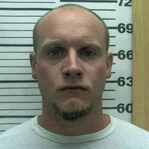 Robert Burton is wanted for murder, Maine State Police say. (Photo courtesy Maine Office of Public Safety)